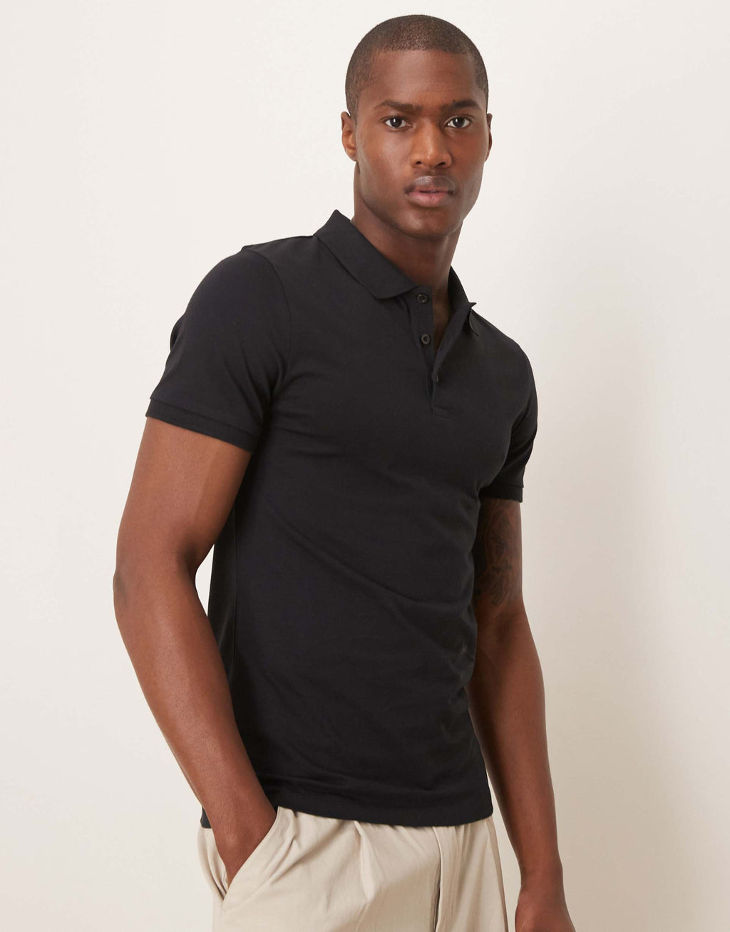 ASOS DESIGN essentials muscle fit polo in black