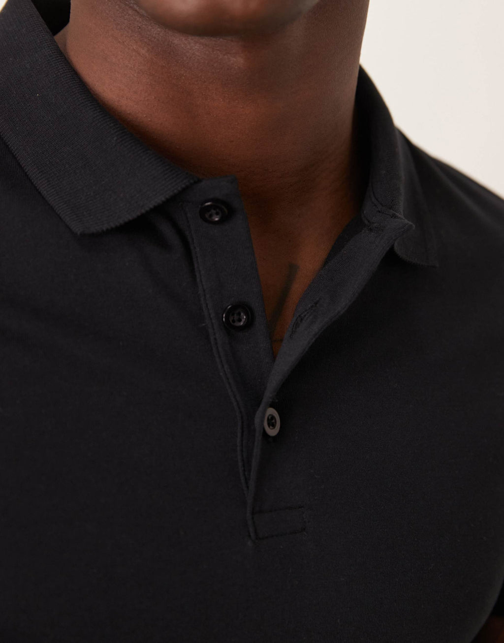 ASOS DESIGN essentials muscle fit polo in black